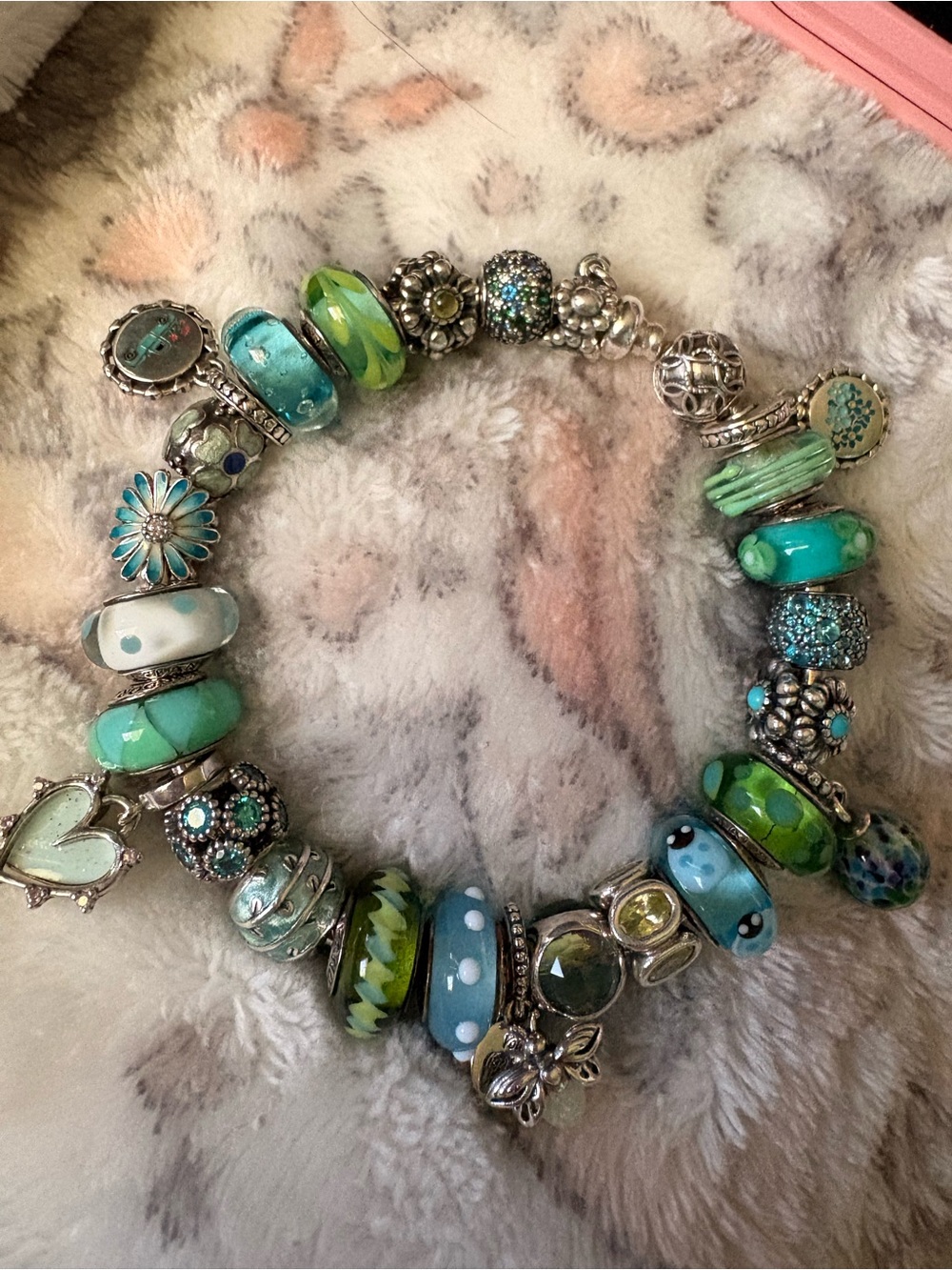 Pandora bangle with blue green charms